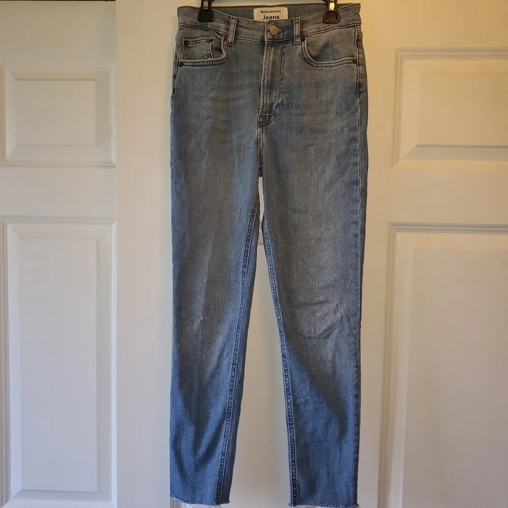 Reformation raw edge skinny jeans.